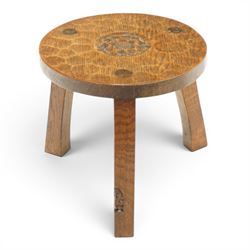 Gnomeman - circular adzed oak stool with carved Yorkshire Rose top, raised on three shaped...