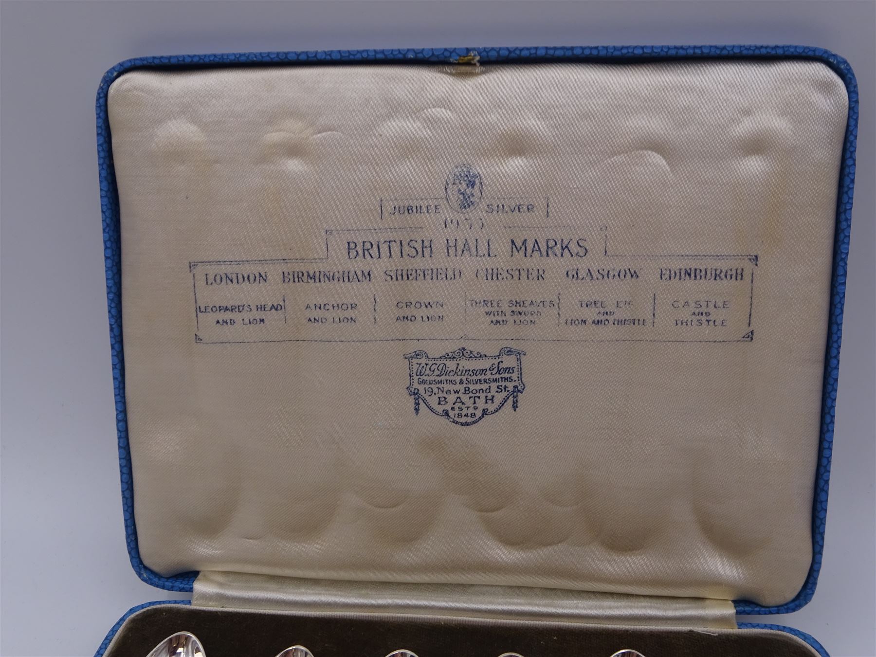 Set of six 1930s silver 'British Hallmarks' spoons by Roberts & Belk Ltd, each depicting a different British hallmark, dated 1935, in fitted case