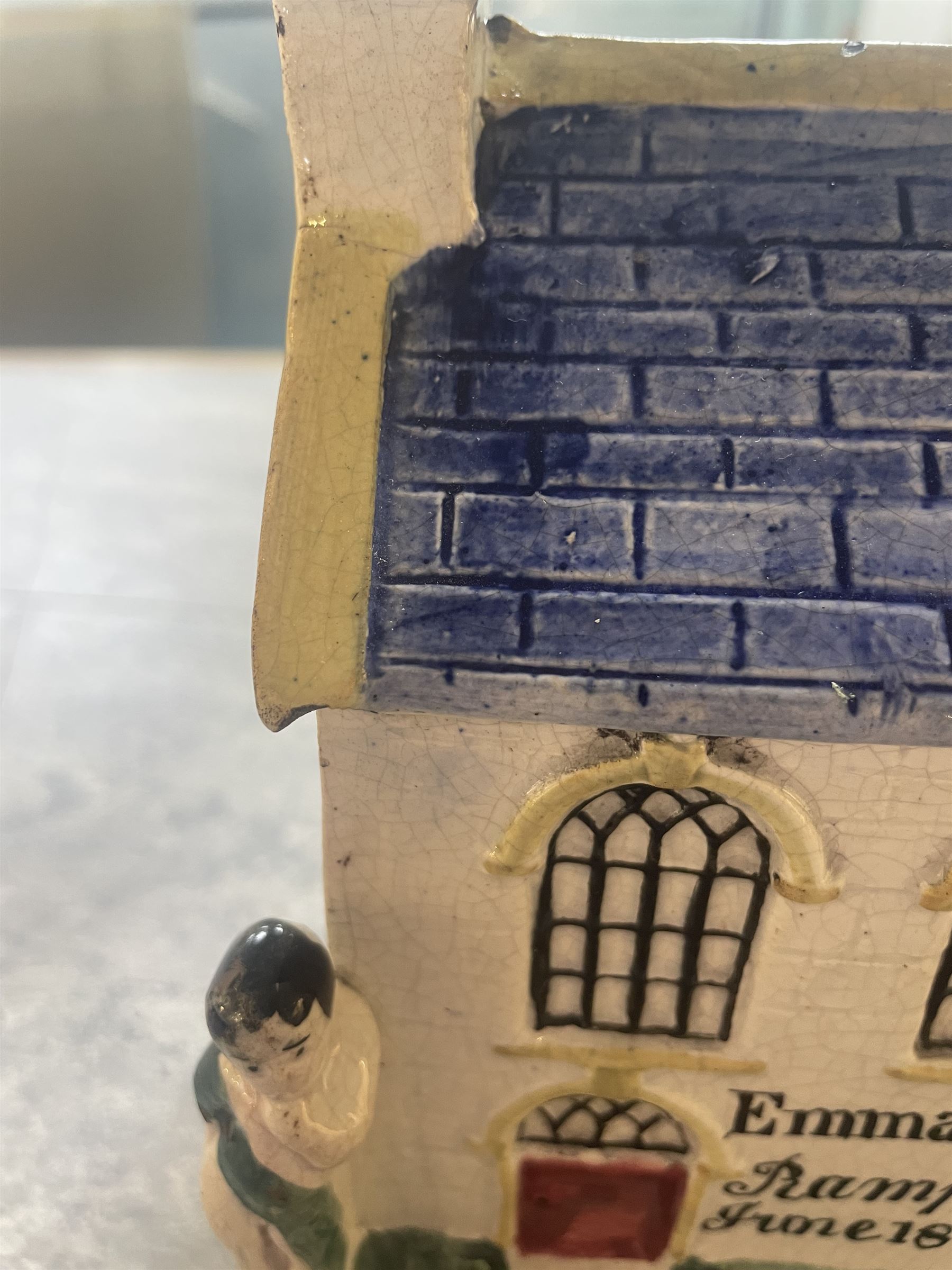 Mexborough Prattware Wesleyan Chapel Money Box, 1848, typically modelled as a chapel with putti to the front corners, on ball feet, inscribed  to the front Emma Sutton Bampton June 18 1848, H17cm, L15cm