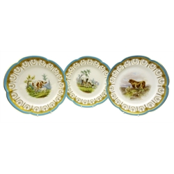  Set of three late Victorian Minton shaped dessert plates hand painted with cattle by Henry Mitchell within a border of gilt beaded swags, floral roundels and crosshatched panels with turquoise rim, the bull and sheep group signed H. Mitchell with printed Stuart Clan Motto to reverse, c1870 pattern no. G154, D24cm (3) Provenance Property of Bob Heath, Brandesburton Formerly of Ravenfield Hall Farm near Rotherham  