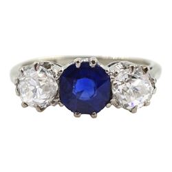 Early 20th century gold three stone old cut diamond and round sapphire ring, sapphire approx 0.60 carat, total diamond weight approx 1.00 carat