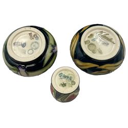 Three miniature Moorcroft vases, one decorated in the Summer Rosette pattern, circa 2011, H6cm, one decorated in Lord of Leith Downs, circa 2008 H6cm and the third decorated in Isis, H6cm 