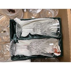 Caithness 'Fireball' paperweight, together with four cased Tyrone Crystal glasses, glass oil lamp, three glass decanters etc, in two boxes