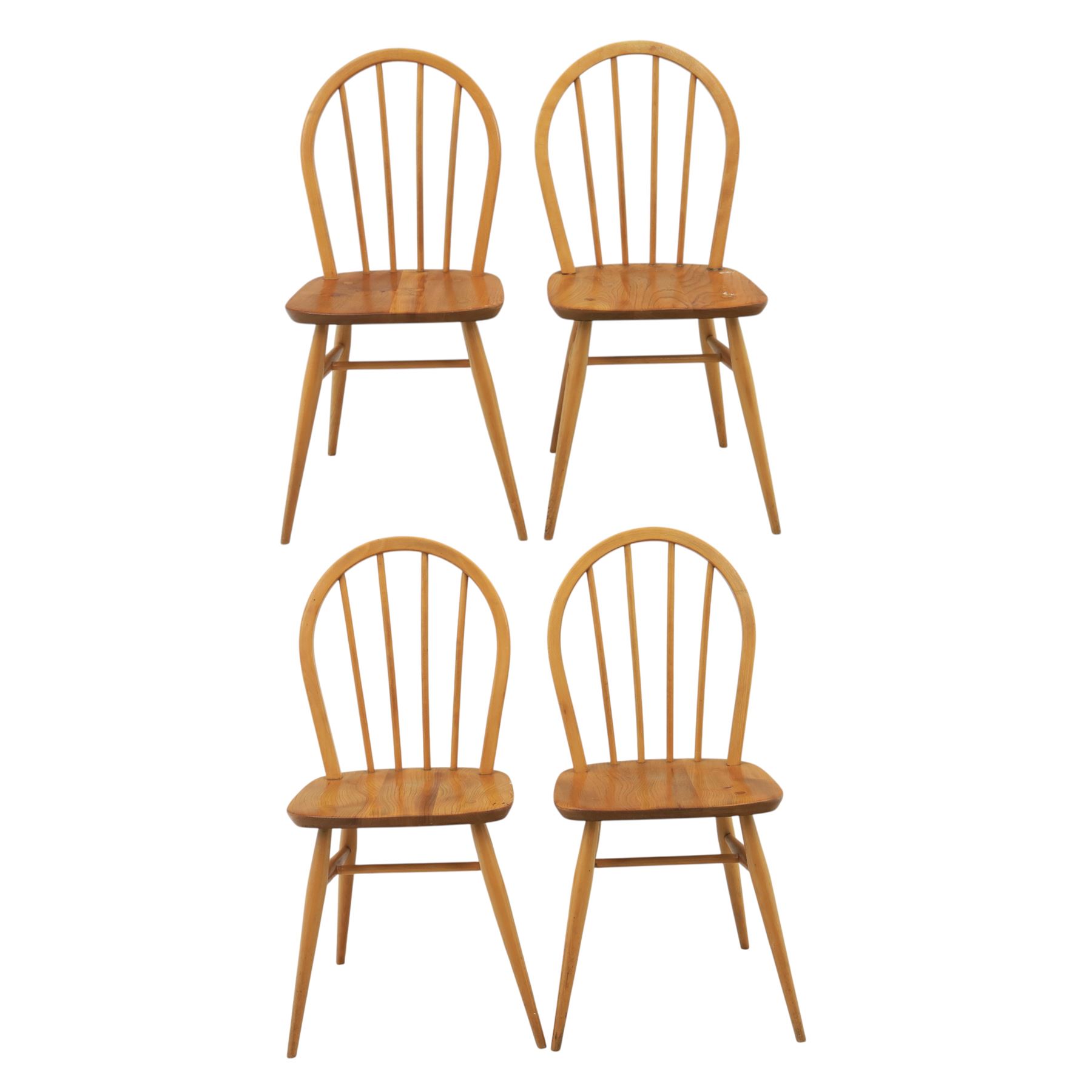 Ercol - set of four 'Windsor' waxed elm chairs, with hoop back design, on tapering supports