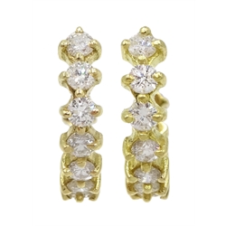 Pair of 14ct gold diamond half hoop earrings