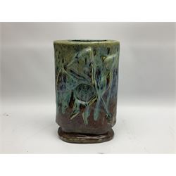 20th Century studio stoneware vase, of flattened tapering form decorated in high relief with geometric design in merging turquoise and brown glaze, signed 'WA' beneath, 32.5cm