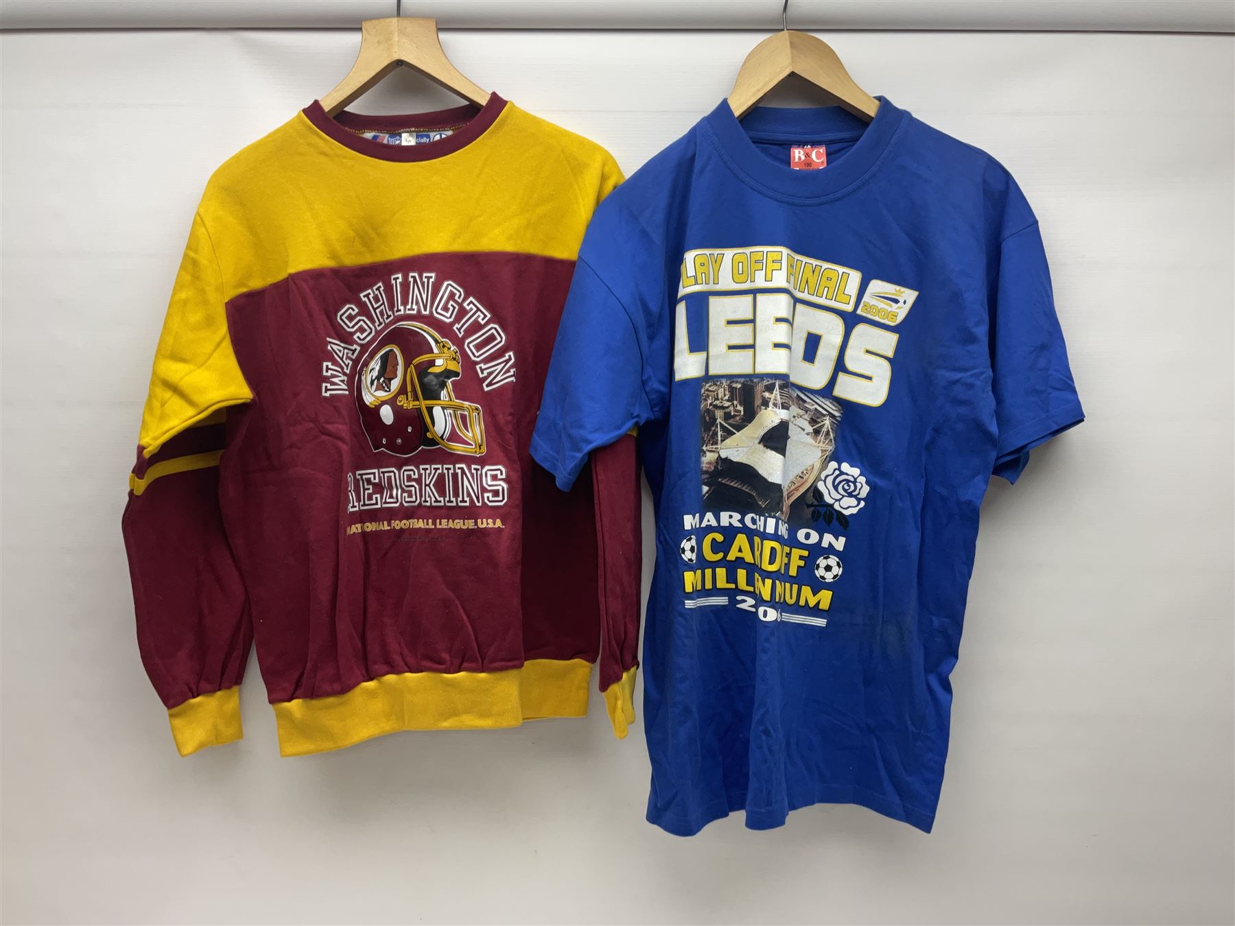 Collection of Leeds United scarves, hats and t-shirts, together with a Washington Redskins NFL sweatshirt and an Australian rugby league shirt