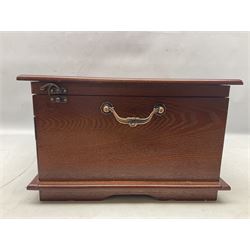 Waltmann und Sohn part canteen of stainless steel and gilt cutlery, the stained wood case with hinged lid above two fitted drawers, L48cm