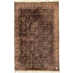  Persian Herati indigo ground rug, the field decorated with repeating Herati motifs, floral design border within guard stripes 