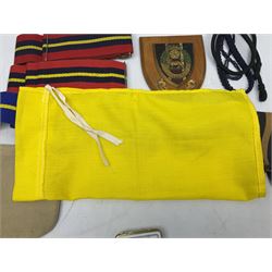 Miscellaneous militaria including two Royal Artillery and one Royal Horse Artillery stable belts; Northamptonshire Regiment trench art brass shell case lighter; unused Matchless Fire-Set; pocket knives and multi-tool; lanyards; oak shield with York & Lancaster crest etc