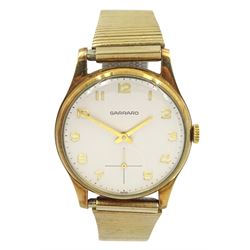 Garrard gentleman's 9ct gold manual wind presentation wristwatch, London 1973, on gilt and stainless steel strap, boxed