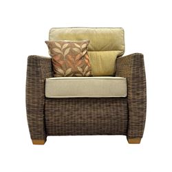 Contemporary two seat rattan conservatory sofa with loose cushions, and pair of matching armchairs, with upholstered seat and back cushions in a beige fabric, curved arms and front complete with scatter cushions 

Chairs (H 92cm, W 75cm, D 84cm)
Sofa (H 92cm, W 130cm, D 84cm)