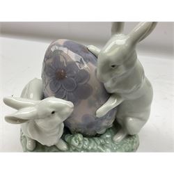 Three Lladro figures, comprising Easter Bunny no 5902,  Tumbling no 5805 and Playing Tag no 5806, two with original boxes, tallest example H16cm