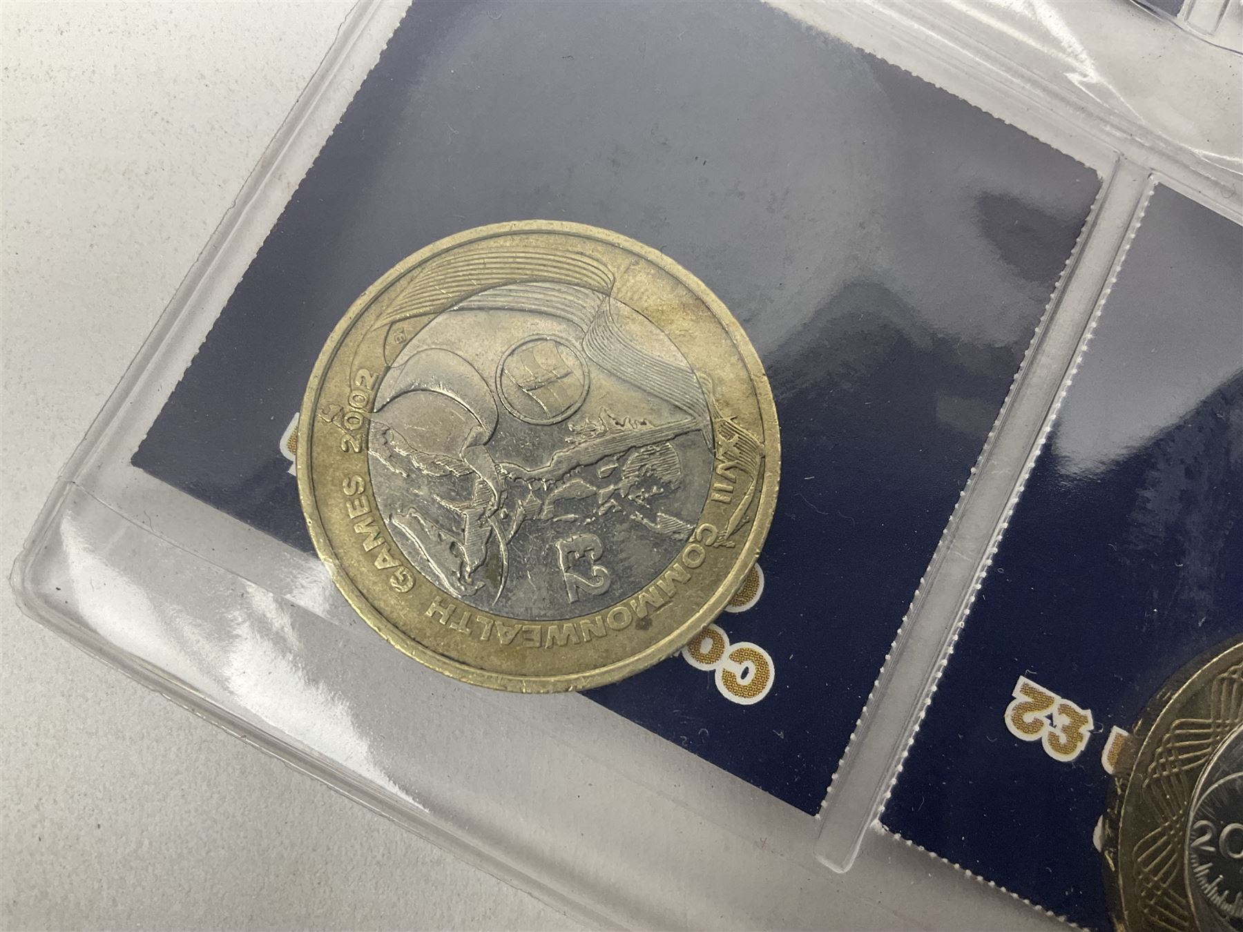 Mostly United Kingdom Queen Elizabeth II commemorative two pound  coins, including 2017 'Jane Austen', 2018 'Sea King', 2018 'Vulcan' etc face value of UK coins approximately 98 GBP