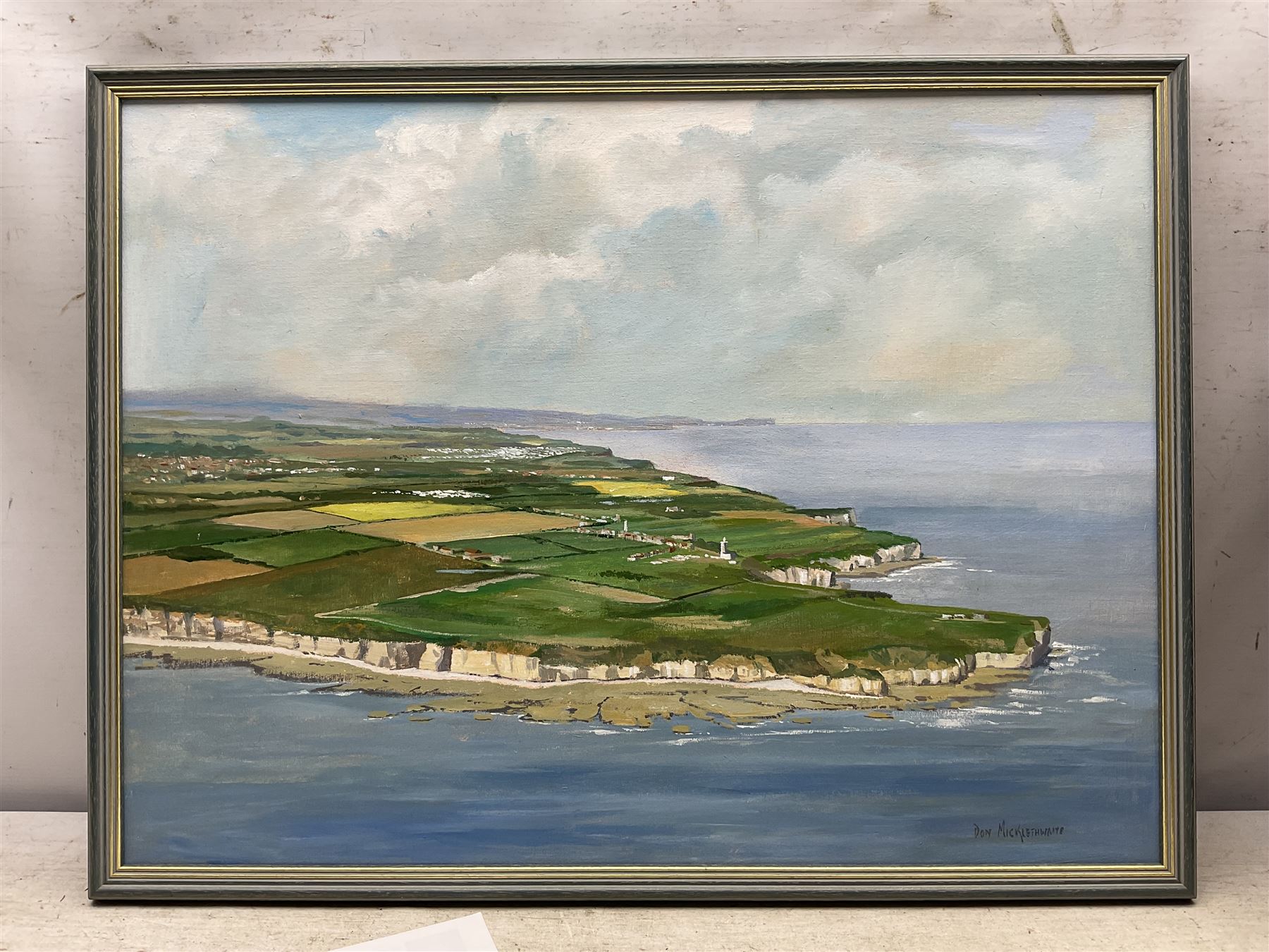 Don Micklethwaite (British 1936-): Aerial View of Flamborough Head, oil on board signed 45cm x 60cm; together with an impressionist oil signed Balmer (2)