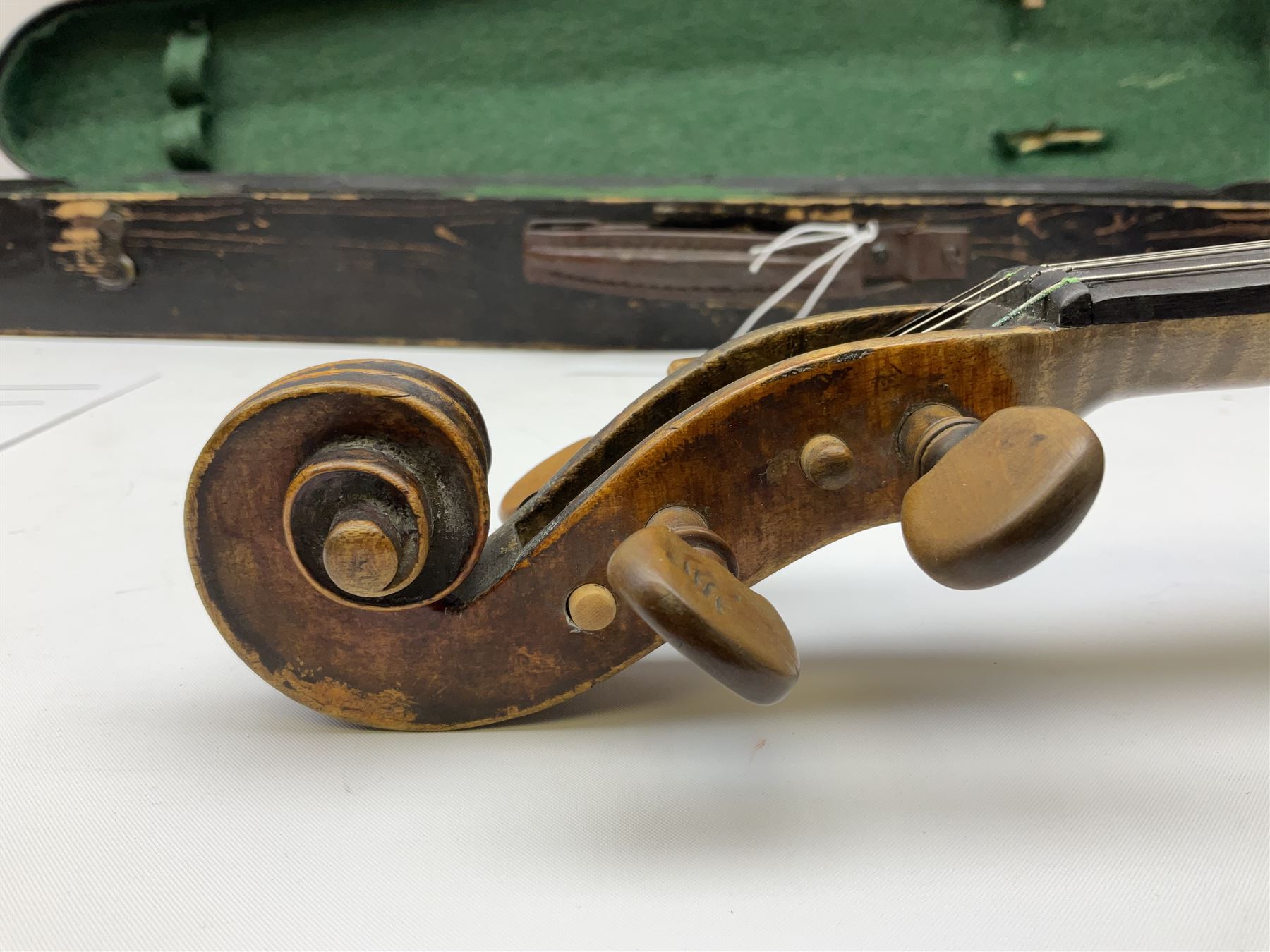 Late 19th century German violin with 36cm two-piece maple back and ribs and spruce top; bears label for 'Thomas Jacklin Violin Maker & Repairer Hull 1879'; 60cm overall; in ebonised wooden coffin case.