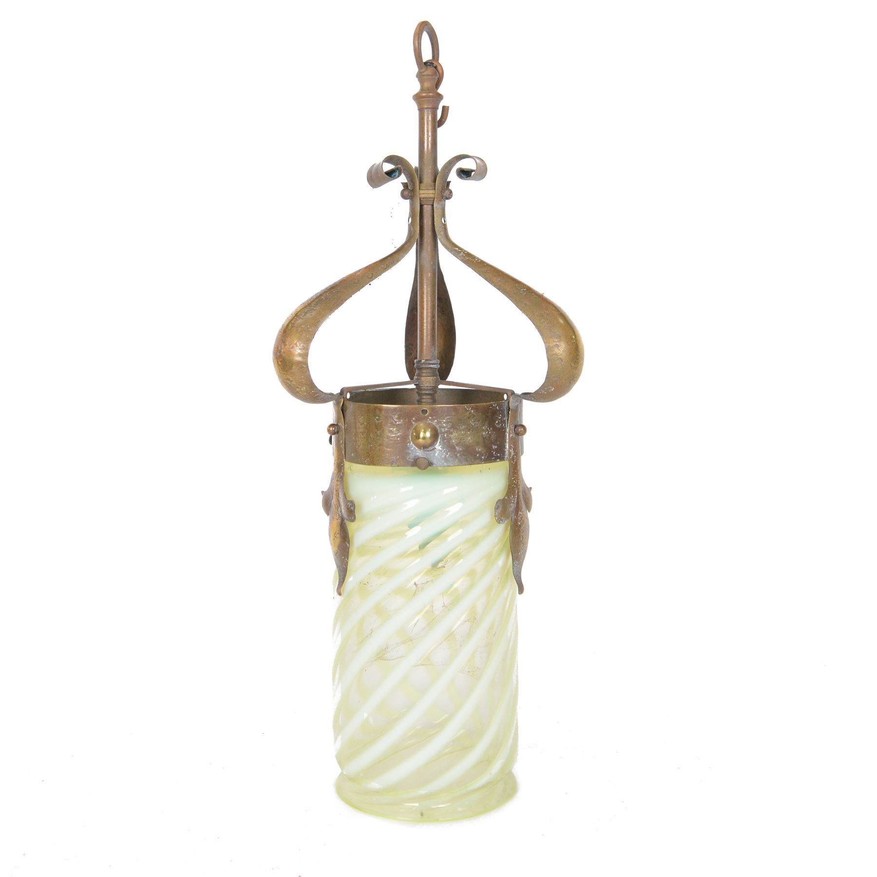 Arts & Crafts brass ceiling lantern with a trio of fluer-de-lis mounted arms, the vaseline glass pendant light shade of cylindrical form with flared rim, H52cm
