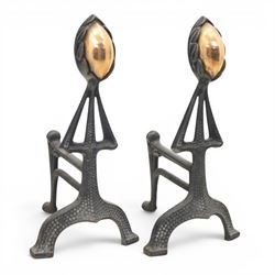 Arts and Crafts cast iron and brass andirons, brass and copper acorn finials above openwor...