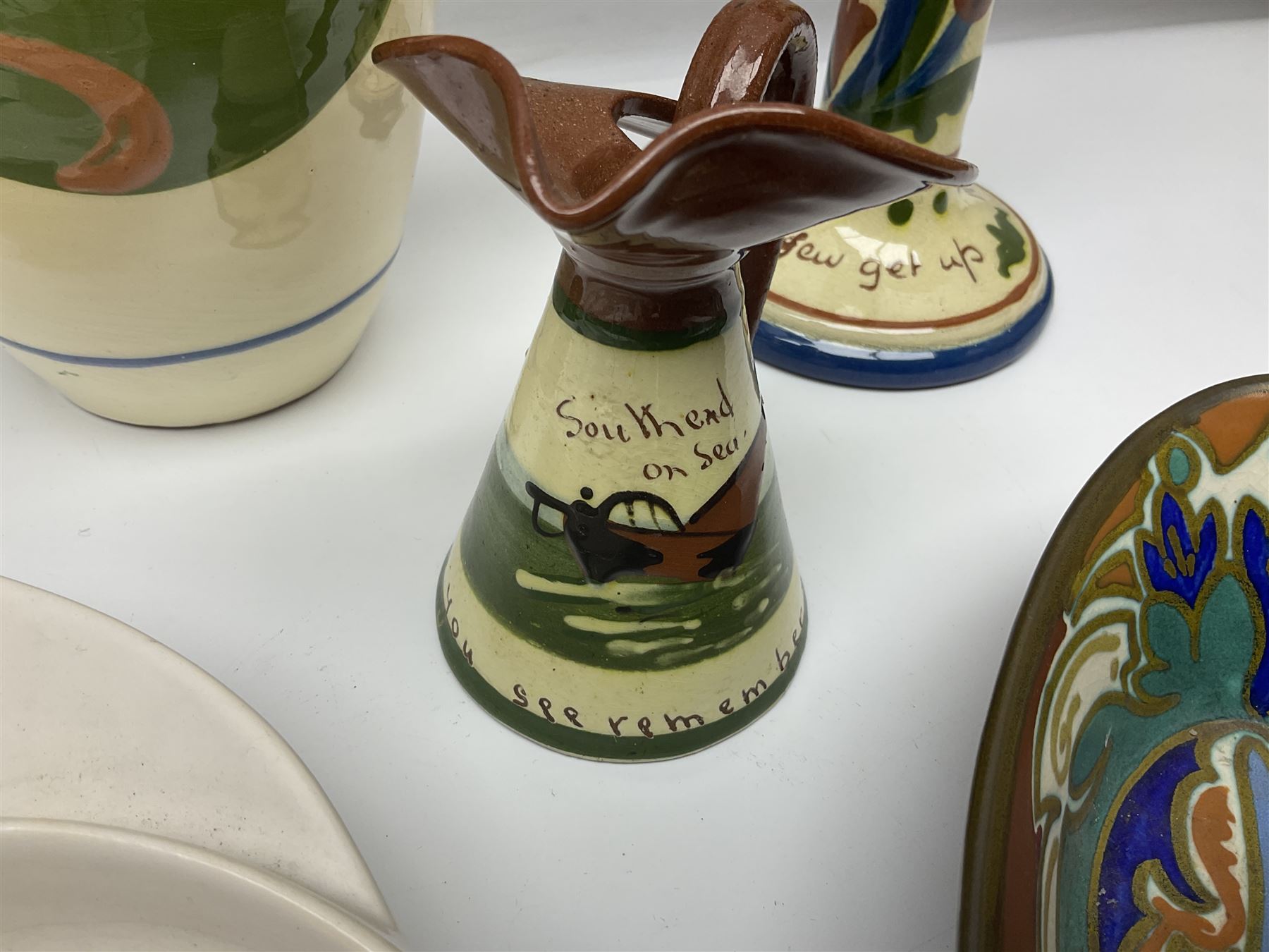  Collection of motto ware to include Torquay examples, together with Gouda vase and dish etc (9)