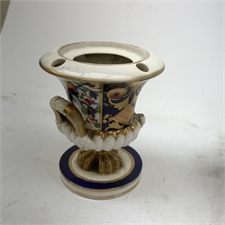 Three Bloor Derby Imari pattern twin handle urms, two examples with covers, each with mark beneath, H12cm, (all a/f), together with a pair of late 19th century Royal Crown Derby Imari pattern urns and covers, each with mark beneath, H13cm, (one significantly a/f). 