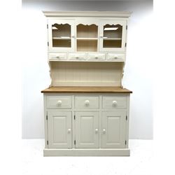 Victorian style painted pine dresser, two cupboard doors enclosing shelving above four short drawers, base unit complete with three drawers above three panelled cupboard doors, raised on a plinth base 