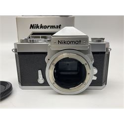 Nikkormat FT2 camera body, serial no. 5066813, in original packaging, together with Nikkormat EL camera body, serial no. 5577358, with Nikon Nikkor 50mm 1:1.8' lens no. 2143575, Nikkormat FT, serial no. 3968385, and Nikomat FT camera body, serial no. 4015491