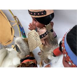 Collection of Native American sleep eye dolls to include approximately five Carlson examples, in traditional leather, beaded and fur dress, together with native style wall hanging in one box