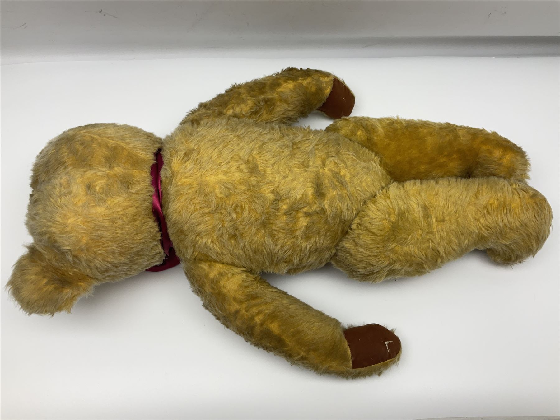 Large post-war Chad Valley plush covered teddy bear with revolving head, applied eyes, vertically stitched nose and mouth, jointed limbs and growler mechanism; stitched label to right foot and Hygenic Toys label to right side H73cm