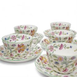 Minton Haddon Hall tea and dinner wares, including six cups and saucers, milk jug, six side plates (two different sizes), one sandwich plate, a large bowl and nine salad bowls 