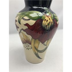 Moorcroft vase of bluster form, decorated in the Anna Lily pattern, designed by Nicola Slaney, no 23/11, with painted and impressed marks beneath, with box, H30cm