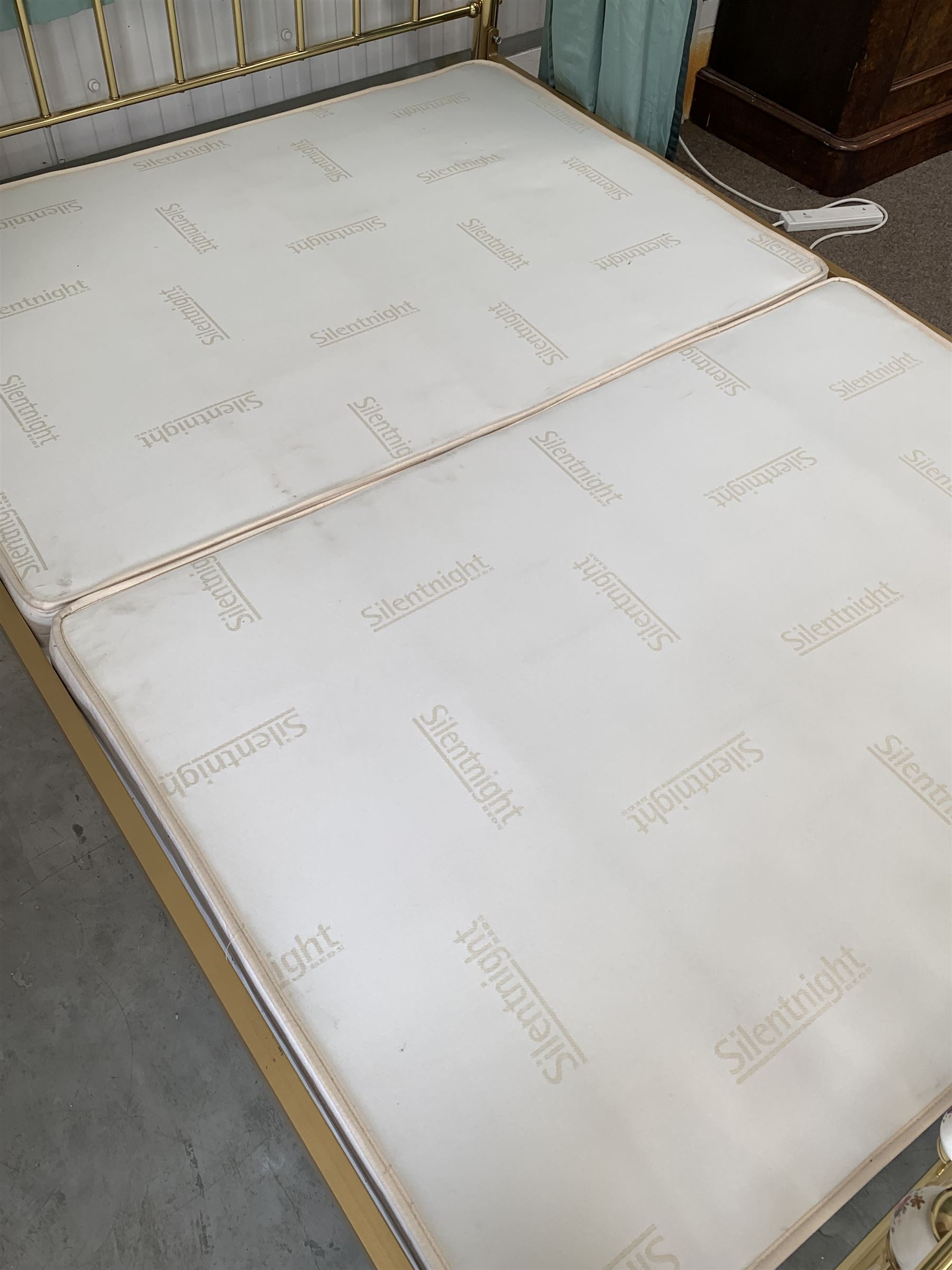 Victorian style brass 4’ 6” double half tester bed with porcelain finials, drapes and covers, fitted with divan base
