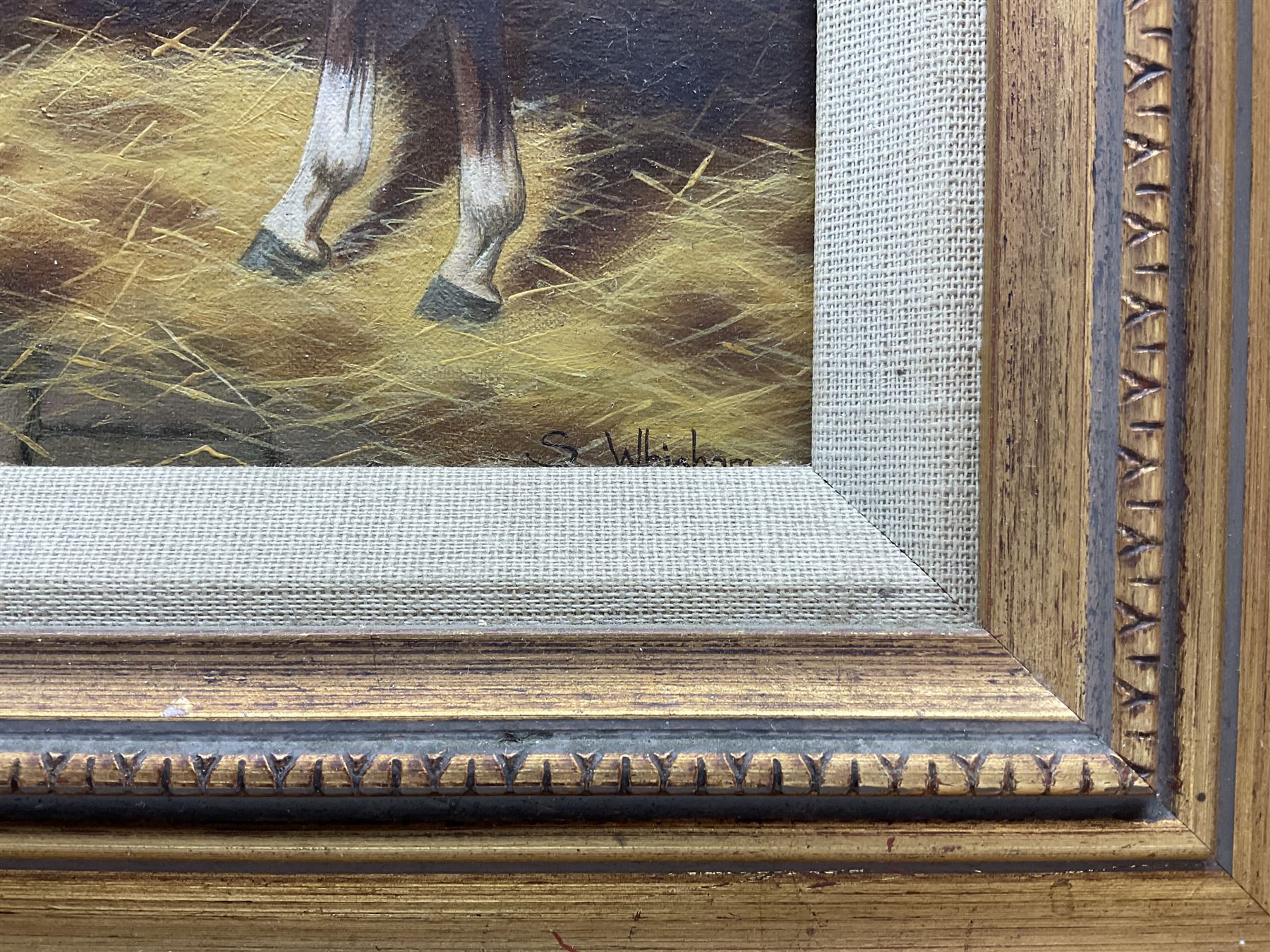 Sue Whigham (British 1957-): Bay Horse in Stable Interior, oil on canvas signed 7.5cm x 23.5cm