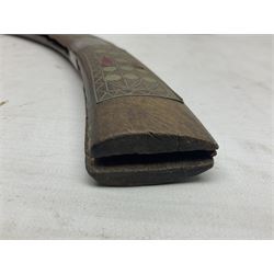 Late 19th/early 20th century Moroccan nimcha dagger-sword, the 40cm curving steel blade with engraved decoration on both sides; shaped hardwood hilt inlaid with brass, white metal wires and red coloured panels; in similarly inlaid scabbard L61cm overall