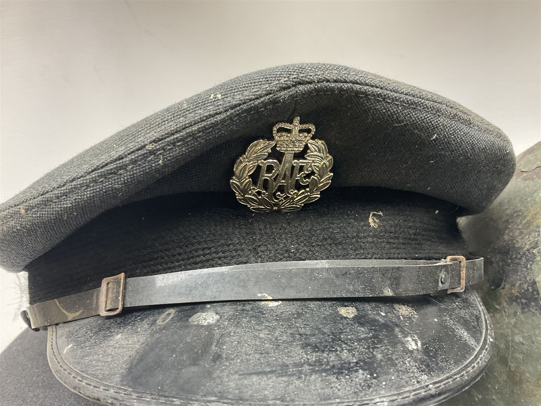Two air force jackets, together with two helmets and Bamberger Mutzen Industrie German military hat and two others 