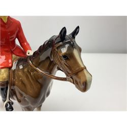 Beswick huntsman upon a bay horse no. 1501, with printed mark beneath, H22cm