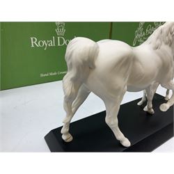 Five Beswick and Royal Doulton horse figures in matt white on black plinths, comprising of  Spirit of Affection no. 2689/2536, Springtime no.2837, Spirit of peace no.2916, Spirit of earth no.2914 and Spirit of the wild no. 183, together with a composite figure of a horse (6)