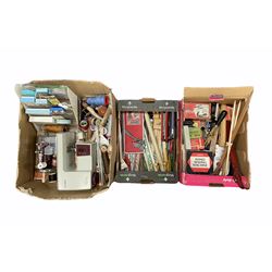 Various knitting and sewing aids to include knitting needles, scissors, sewing machine parts in original boxes, Tiny Tailor Singer sewing machine, another miniature sewing machine etc in three boxes
