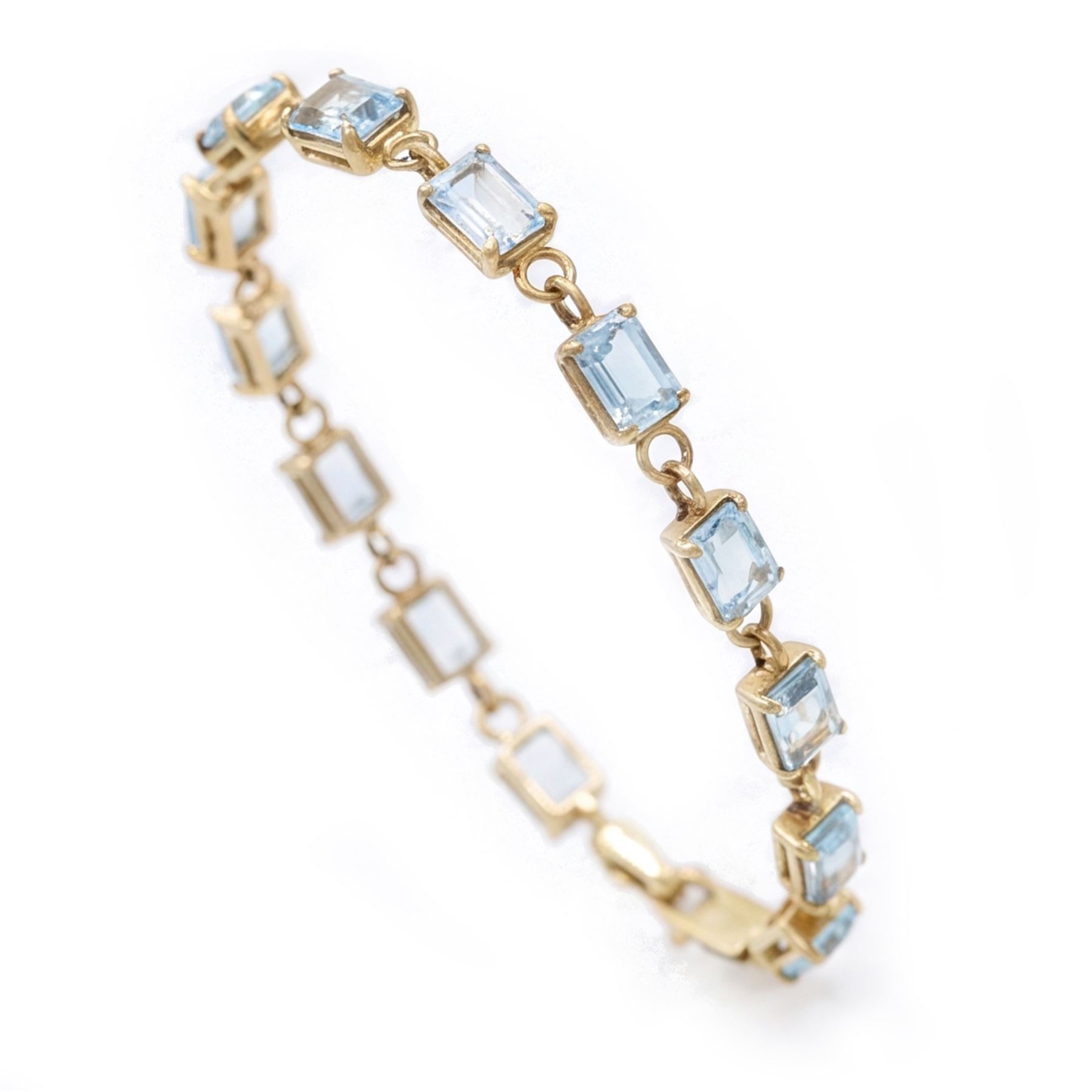 9ct gold Swiss blue topaz bracelet, set with thirteen rectangular cut topaz's, hallmarked