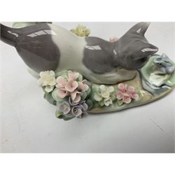 Six Lladro figures, comprising Naughty Dog no 4982, Best Friend 7620 and My Buddy no 7609, Kitty Confrontation no 1442, It Wasn't Me no 7672 and Rabbit Eating no 4772, three with original boxes, largest example H22cm