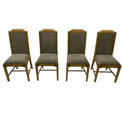 Windsor by Mark Devany oak rectangular extending dining table, with butterfly leaf, and four chairs with upholstered seats and backs