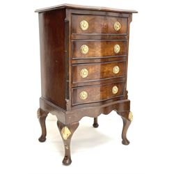 Small 20th century serpentine walnut four drawer chest, shell carved cabriole supports