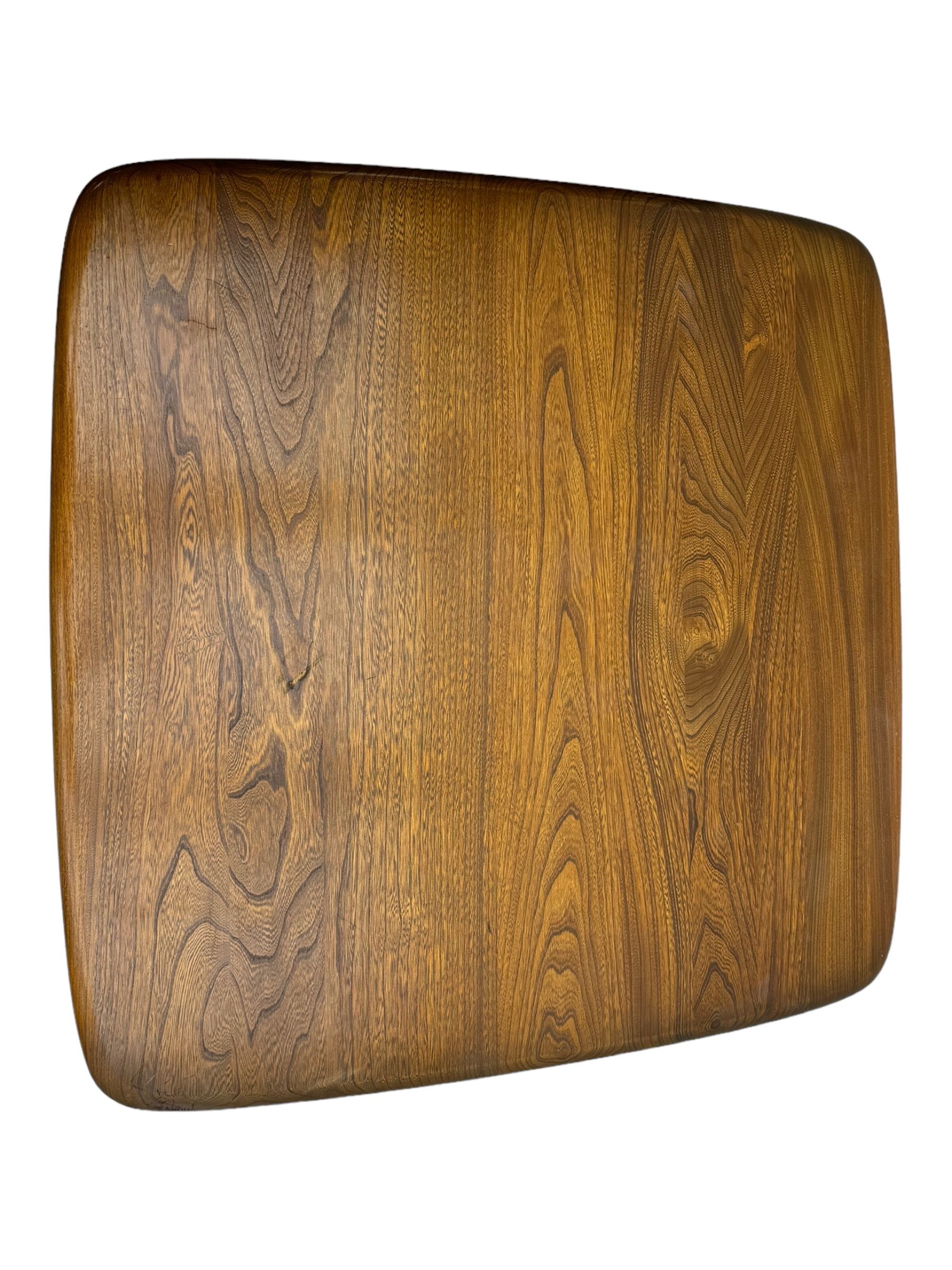 Lucian Ercolani for Ercol - elm 'Pandora's Box' coffee table, square top with rounded corners over two drawers with sculpted recessed pulls, open sides supporting undertier, on castors 