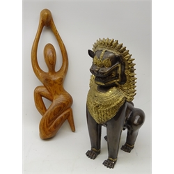  Chinese cast Lion Dog with brass detail, H41cm and a hardwood carved model of a nude woman (2)  