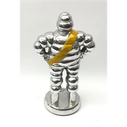 A polished aluminium Michelin man figure, H33.5cm.