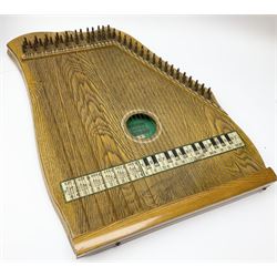 Supertone stringed accordion by Abbley & Son London with simulated oak finish and transferred keyboard No.169, L52cm; in carrying case with sheet music