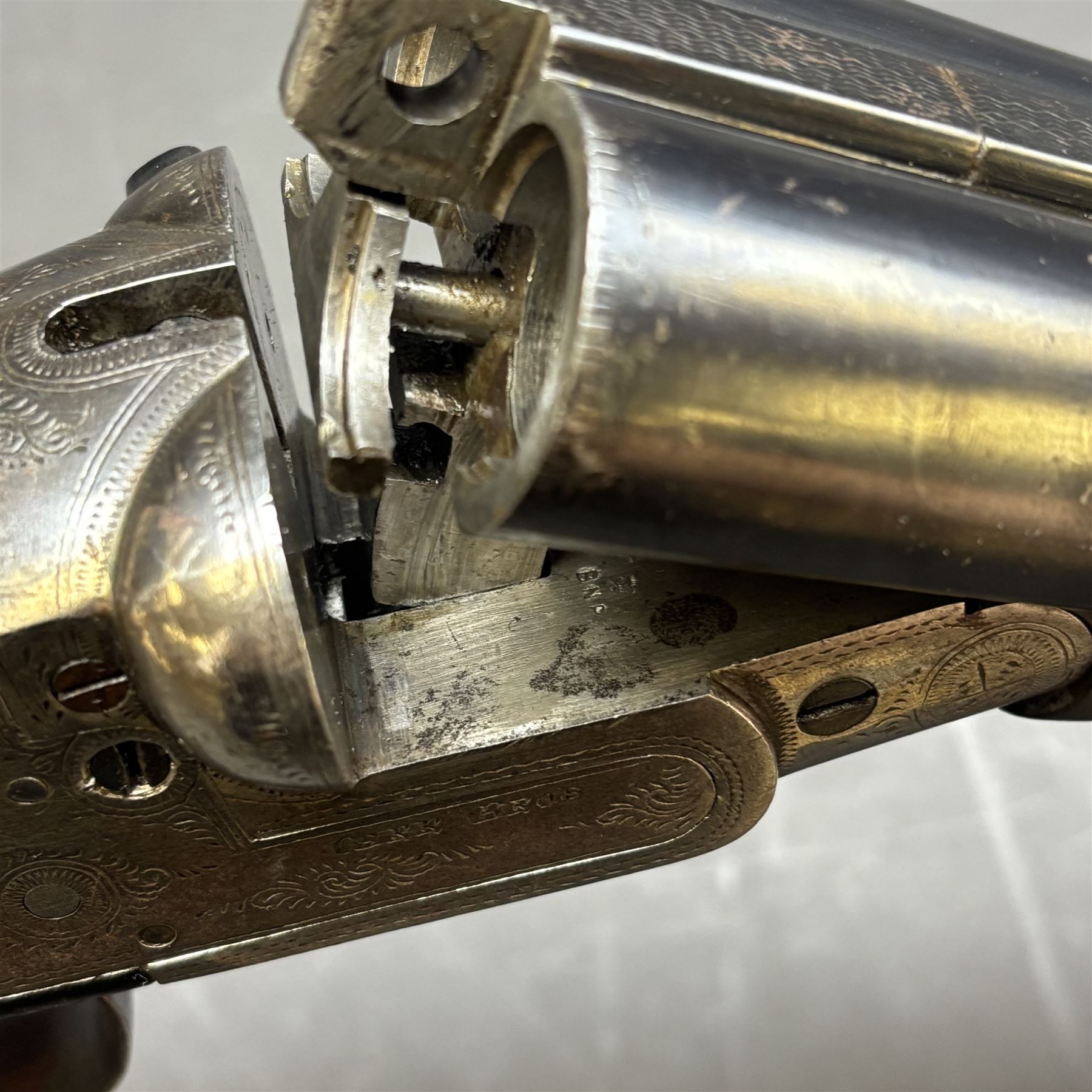 Carr Brothers of Huddersfield 12 bore side by side shotgun with engraved sidelock plates, trigger guard, underside, top plate, thumb lever and fences, chequered semi-pistol grip and horn tipped forend, vacant cartouche to the underside of the stock, double trigger and named 28 inch sleeved barrels choked ¾ and ½, overall length 113cm SHOTGUN CERTIFICATE REQUIRED