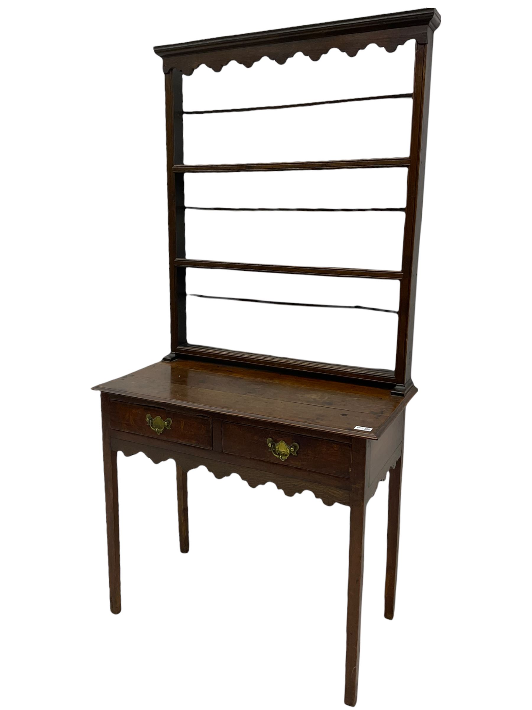 Georgian oak lowboy side table, fitted with two drawers, with plate rack