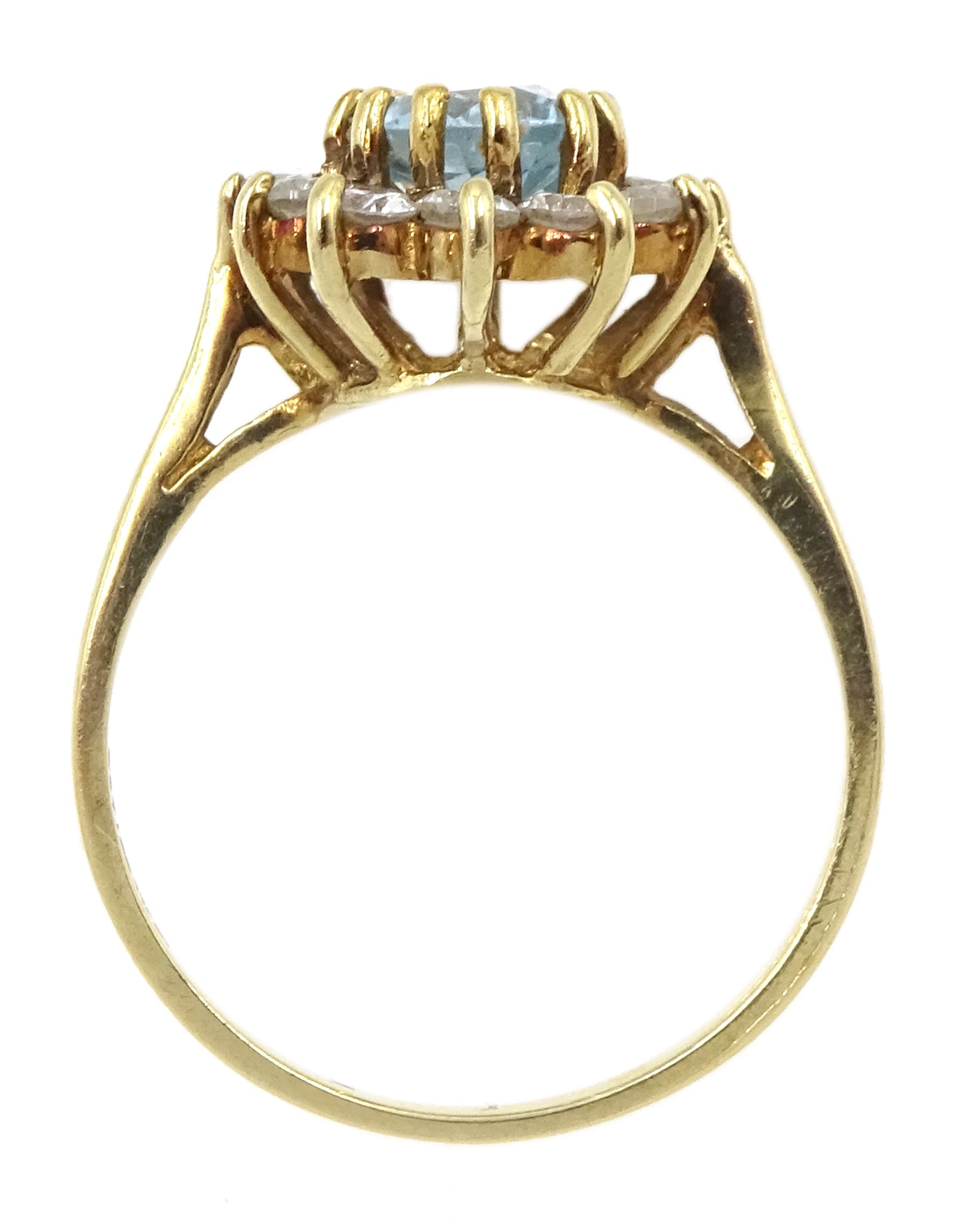 9ct gold oval blue topaz and cubic zirconia cluster ring, hallmarked 