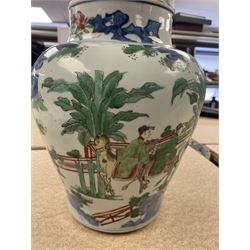 17th century Transitional period Chinese Wucai vase and cover, of baluster form, the body painted with ladies upon a terrace, and figures upon horseback and attendants within a fenced garden, the domed cover with knop finial painted with boys at play, H37cm
