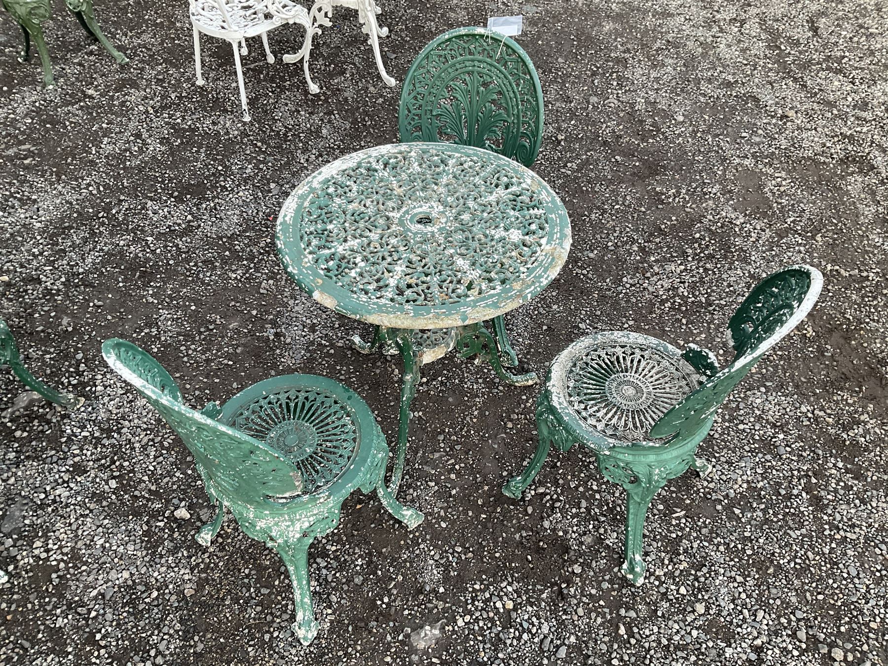Painted aluminium circular garden table and three chairs - THIS LOT IS TO BE COLLECTED BY APPOINTMENT FROM DUGGLEBY STORAGE, GREAT HILL, EASTFIELD, SCARBOROUGH, YO11 3TX